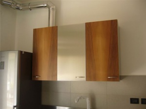 Cucina inox con finitura in legno
